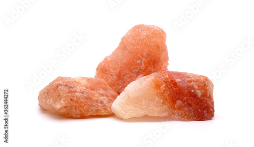 Himalayan rock salt Isolated on white background photo