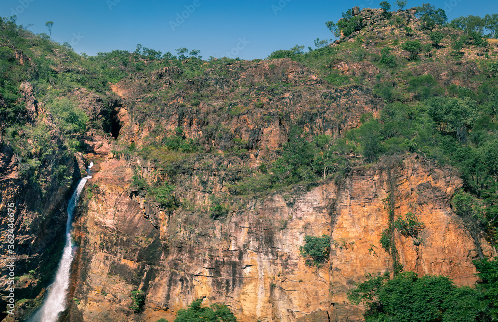 Frontal panoramic view of Tolmer Falls. Dry season. Vintage coloured. Isolated location at Litchfield national park, Northern Territory NT, Australia