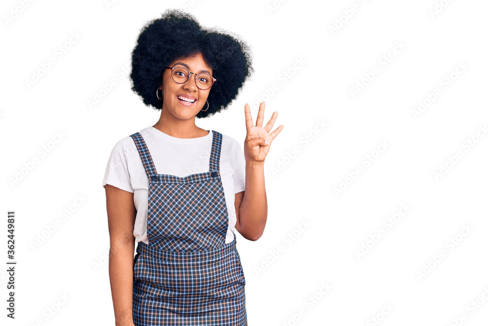 Young african american girl wearing casual clothes showing and pointing up with fingers number four while smiling confident and happy. Young african american girl wearing casual clothes showing and pointing up with fingers number four while smiling confident and happy.