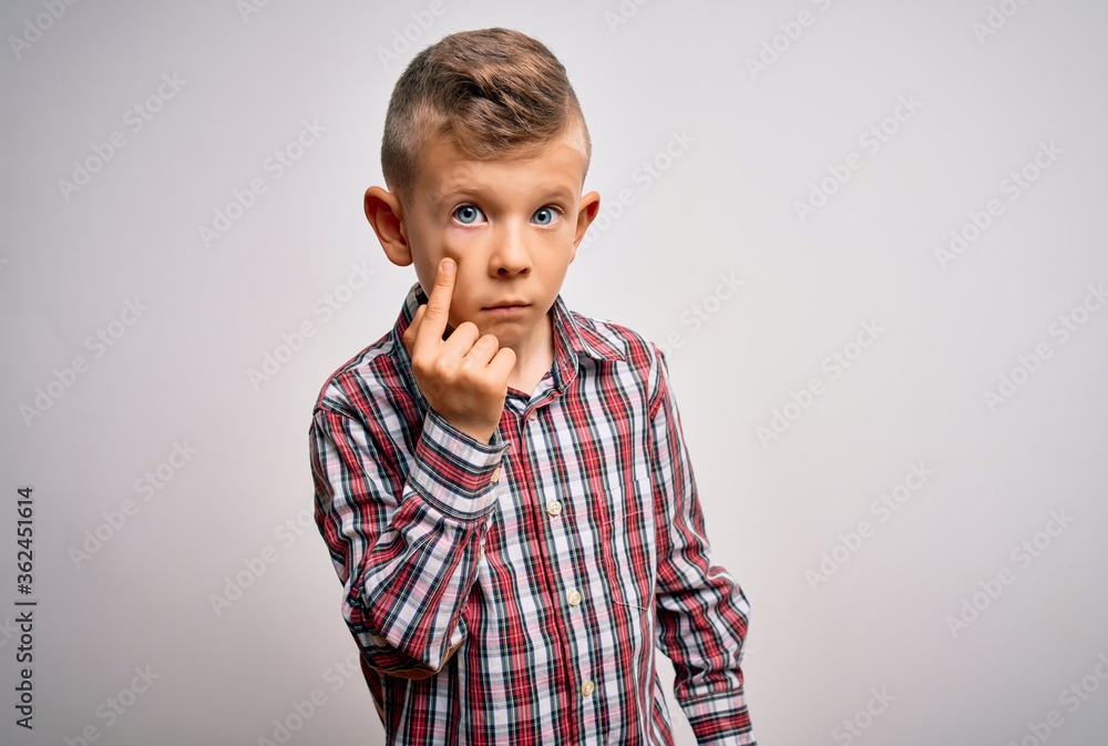 Young little caucasian kid with blue eyes wearing elegant shirt standing over isolated background Pointing to the eye watching you gesture, suspicious expression Young little caucasian kid with blue eyes wearing elegant shirt standing over isolated background Pointing to the eye watching you gesture, suspicious expression
