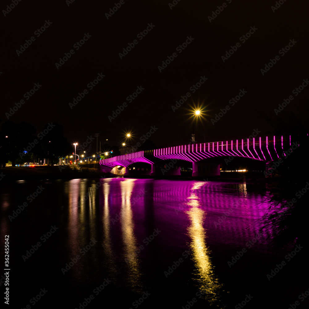 Bridge on water in Melbourne at night