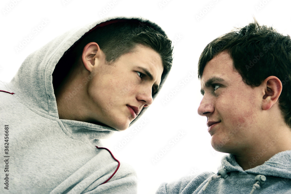 Two boys looking at each other