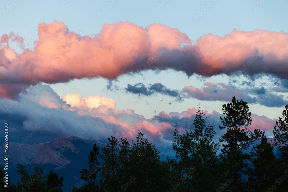Super puffy clouds on a sunset in the mountains
