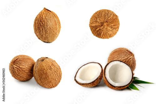 Set of coconut with half and leaves isolated on white background.