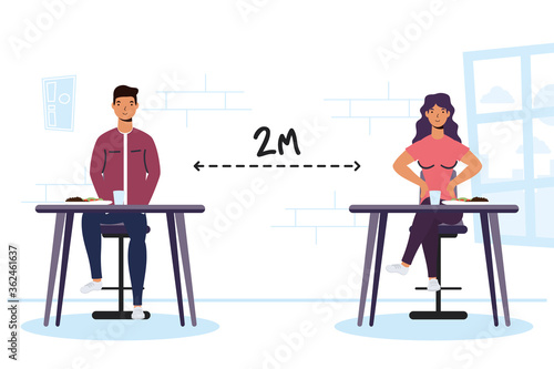 young couple dinning in restaurant practicing social distancing ,covid19 prevention method