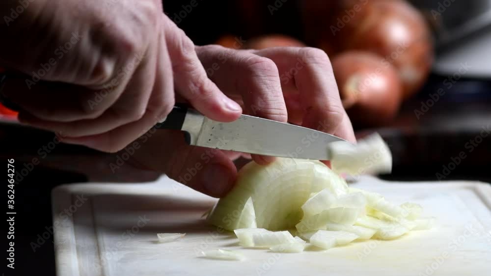 Chopping an onion, close shot Chopping an onion, close shot