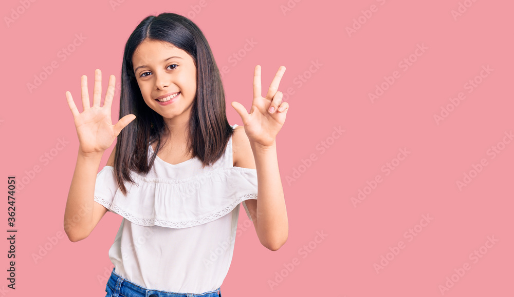 Beautiful child girl wearing casual clothes showing and pointing up with fingers number eight while smiling confident and happy. Beautiful child girl wearing casual clothes showing and pointing up with fingers number eight while smiling confident and happy.