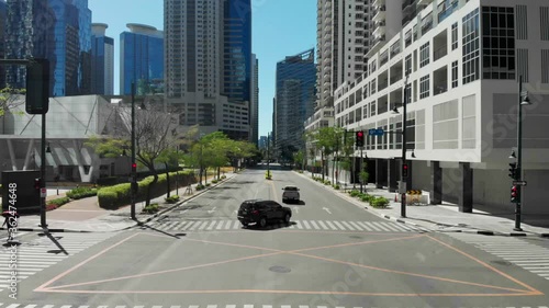 Cars are driving on empty streets of BGC during the quarantine in Manila, Philippines. Taguig, Bonifacio Global City photo