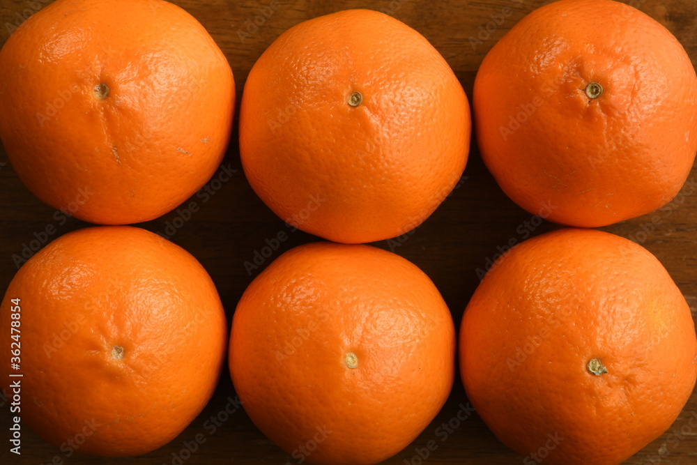 Mandarin orange fruits on wooden background Mandarin orange fruits on wooden background