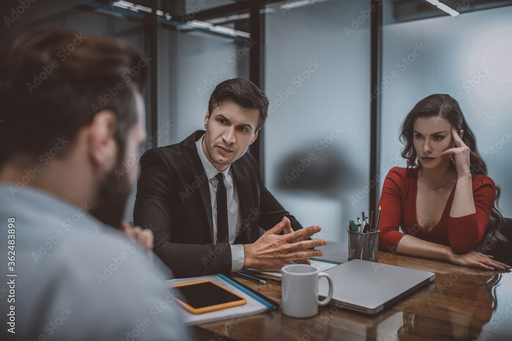 Calm and confident layer resolving a dispute between spouses Calm and confident layer resolving a dispute between spouses