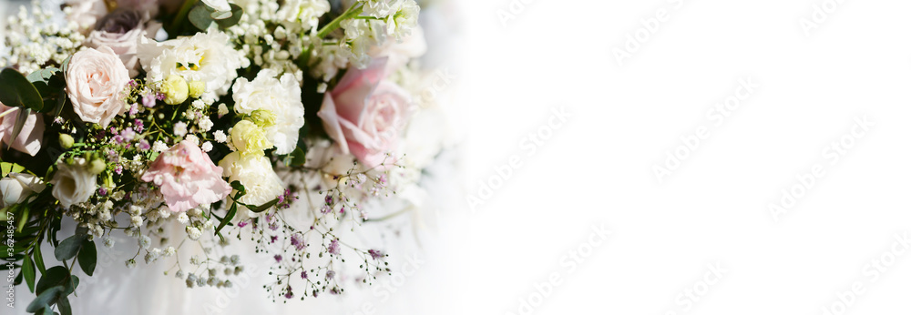 Wedding flower arrangements and decorations. Empty copyspace with white background and space for text. Holiday accessories and backgrounds