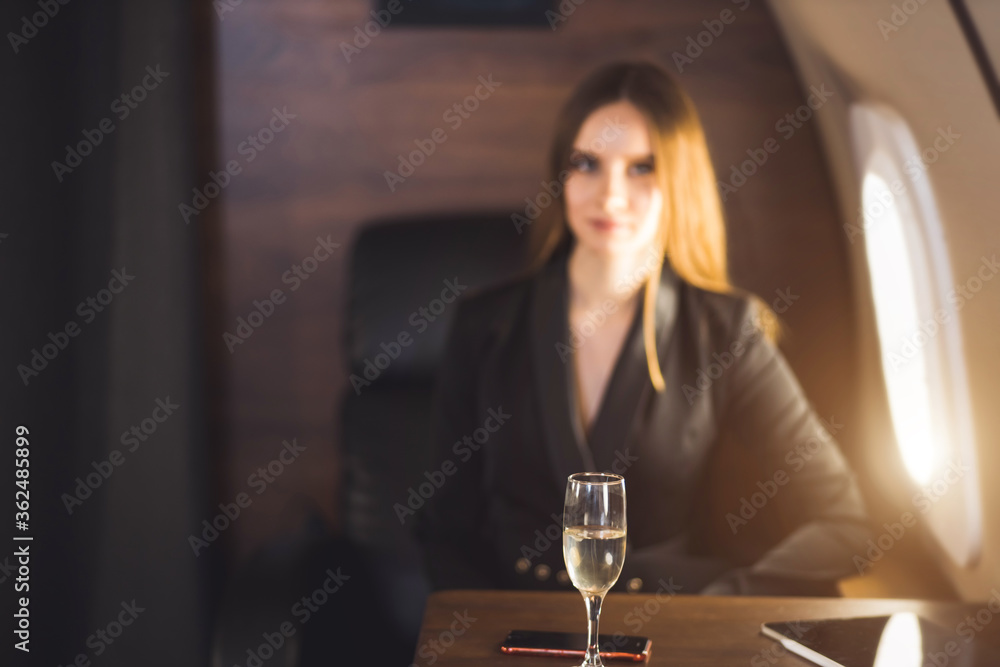 Attractive woman in private jet Attractive woman in private jet