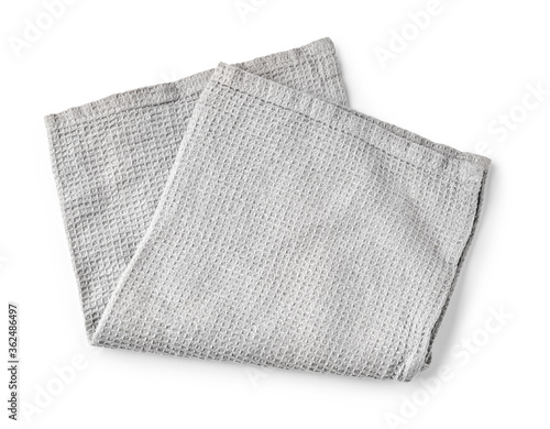 Kitchen grey folded table cloth isolated on white background. Top view of napkin.