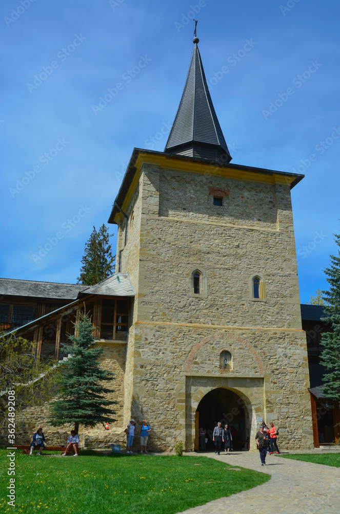 SUCEVITE MONASTERY, BUCOVINA, ROMANIA, EUROPE, SPRING 2018. One of the four towers that are inside the stone wall that surrounds the Orthodox monastery. Moldovan architectural style.