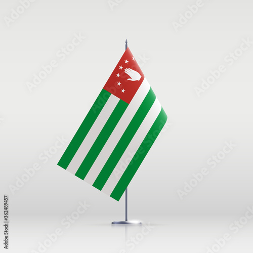 Abkhazia flag state symbol isolated on background national banner. Greeting card National Independence Day of the republic of Abkhazia. Illustration banner with realistic state flag.