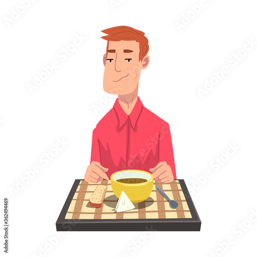 Young Man Having Dinner, Cheerful Guy Sitting at Table with Checkered Tablecloth Cartoon Vector Illustration