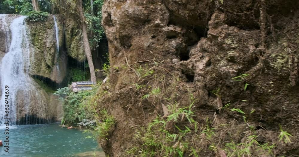 Slide video waterfall on hill in tropical rainforest green tree Phayao Thailand