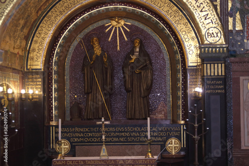 Cassino, Italy - July 5, 2020: The central chapel with the statues of San Benedetto and Santa Scolastica in the basilica of Montecassino photo