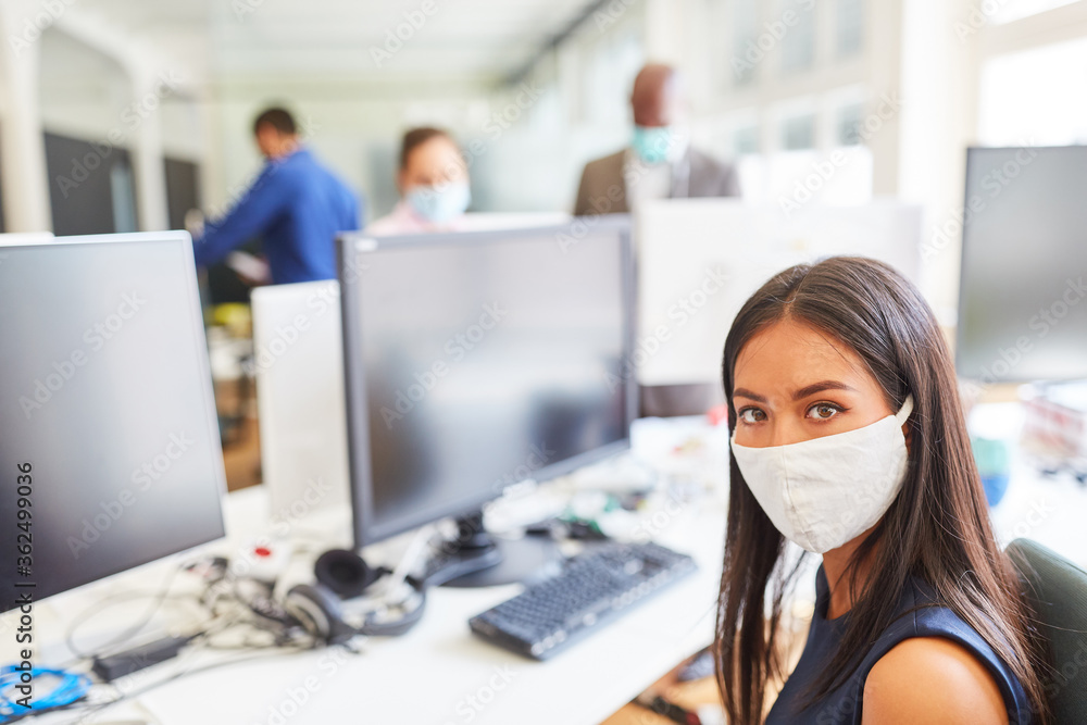 Business woman with mouth and nose protection because of Covid-19 Business woman with mouth and nose protection because of Covid-19