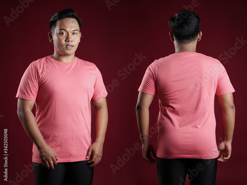 Front and rear portrait of a young man. Young male in blank pink t-shirt, front and back view, isolated red background with clipping path. Design men tshirt template and mockup for print.