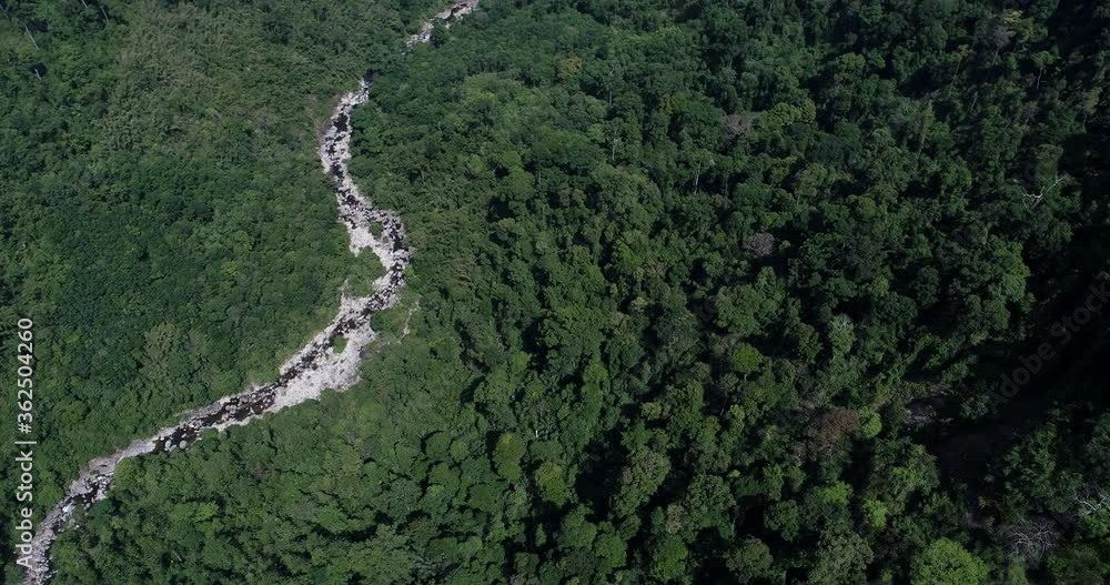 Aerial view waterfall in deep tropical forest mountain green tree Aerial view waterfall in deep tropical forest mountain green tree