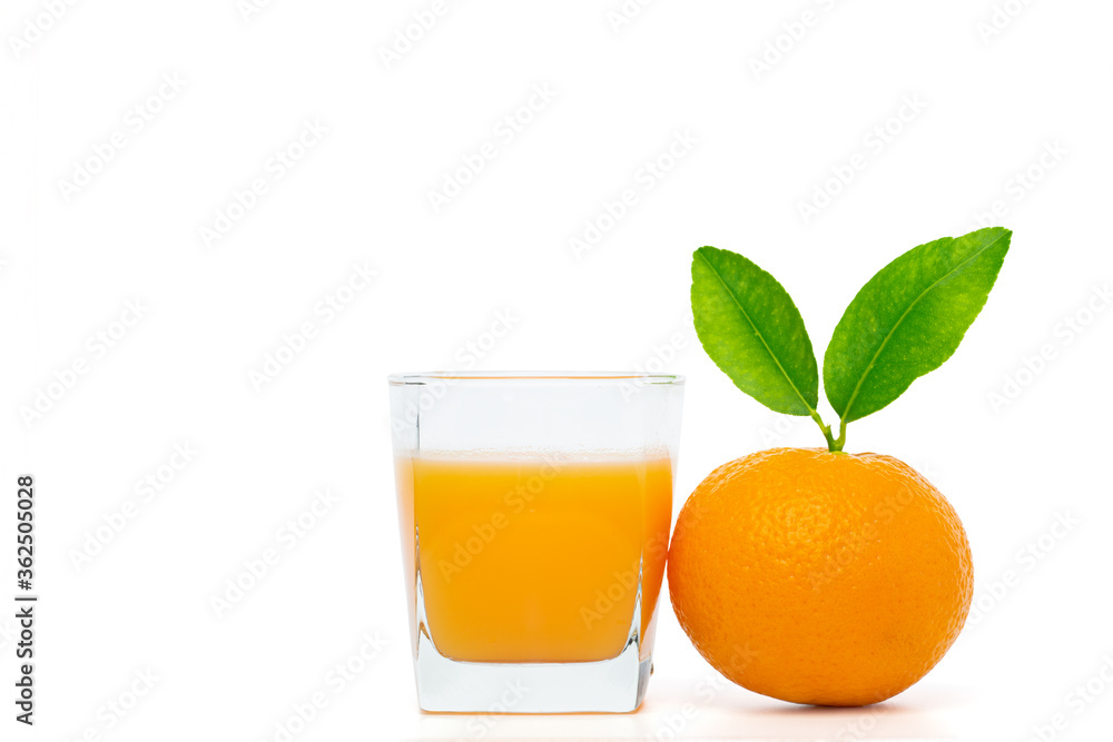 Orange juice in glass with oranges on white background. Orange juice in glass with oranges on white background.