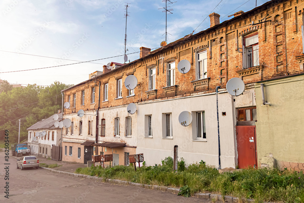 Facade of an old post-Soviet two-story house.