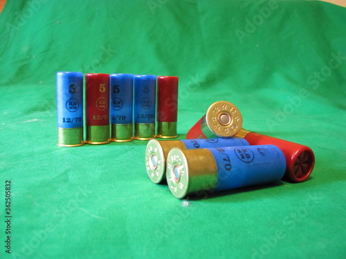 shotgun cartridges 12 gauge on a monotonous background photo