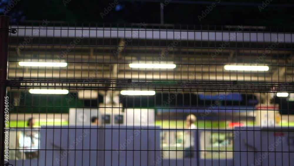 Evening scene Japan train station from outside fence euban life transportation concept Evening scene Japan train station from outside fence euban life transportation concept
