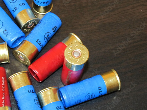 shotgun cartridges 12 gauge on a monotonous background