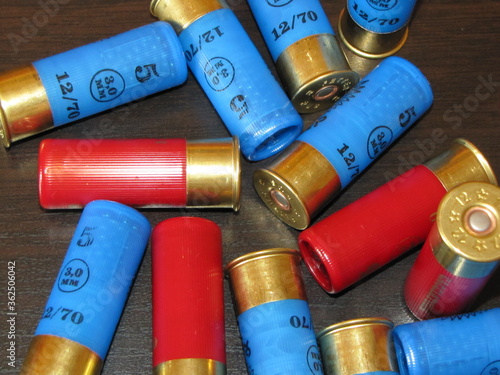 shotgun cartridges 12 gauge on a monotonous background