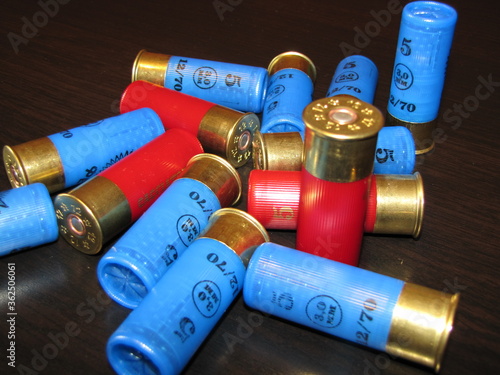 shotgun cartridges 12 gauge on a monotonous background