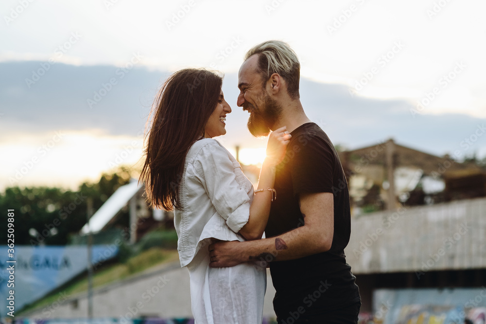 Beautiful young couple have fun. Her happiness is everything to him. Beautiful young couple have fun. Her happiness is everything to him.