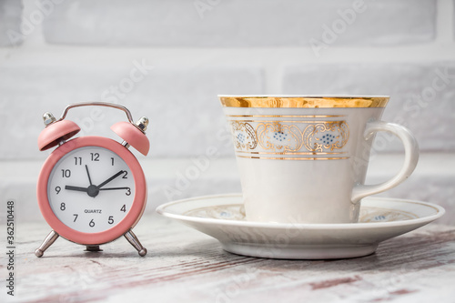 cup of coffee and clock 