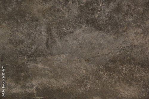 fondo abstracto con manchas grises sobre suelo de cemento