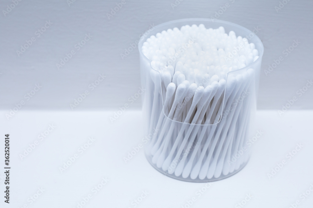 Cotton buds or cotton swabs in transparent plastic box isolated on white background. Cotton buds or cotton swabs in transparent plastic box isolated on white background.