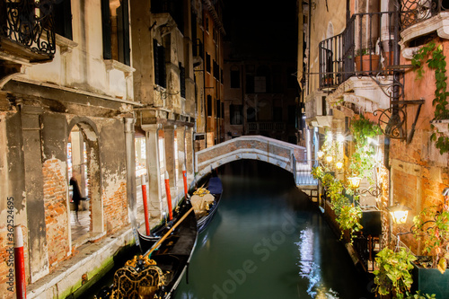 View of Venice´s small canal at night  from a bridge © Dronemetrics