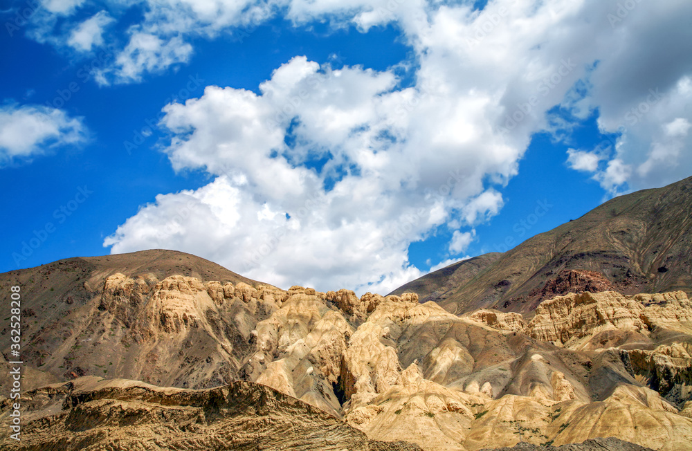 Mountain road and moon land (Moonland) view of Lamayuru at Ladakh, Jammu and Kashmir, India Mountain road and moon land (Moonland) view of Lamayuru at Ladakh, Jammu and Kashmir, India