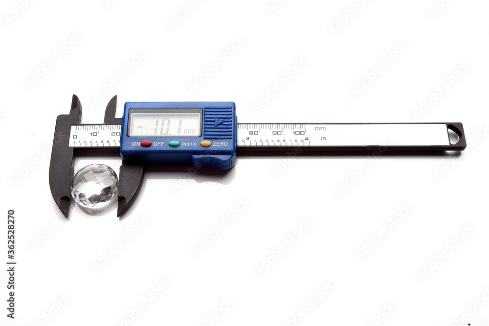 Different goldsmiths tools on the jewelry workplace. Desktop for craft jewelry making with professional tools. White background. Different goldsmiths tools on the jewelry workplace. Desktop for craft jewelry making with professional tools. White background.