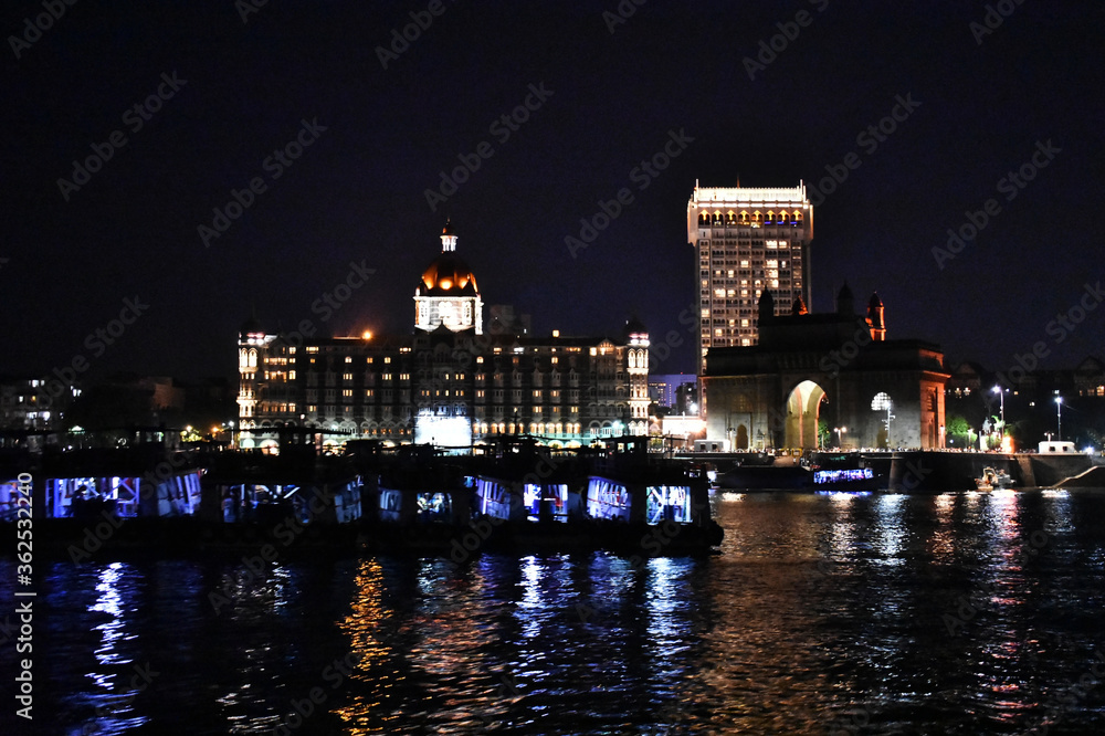 beautiful reflection of night lights near mumbai port captured at night