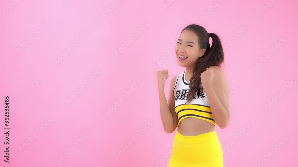 A three-quarter view of a female cheerleader reacting. Copy space A three-quarter view of a female cheerleader reacting. Copy space