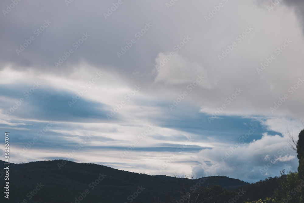 morning sky with beautiful clouds over the hills of Tasmania