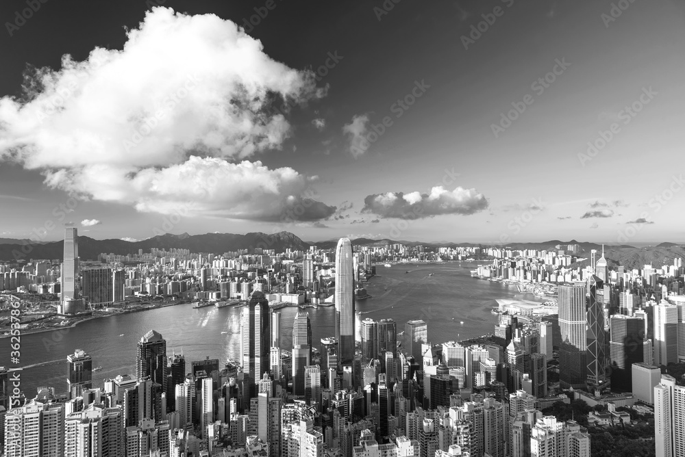 Victoria Harbor of Hong Kong city, viewed from the peak under sunset