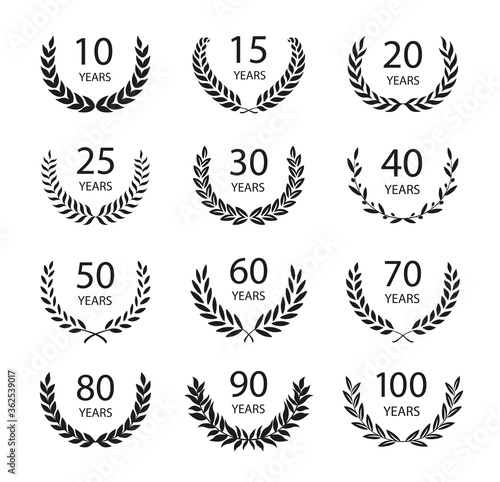 Set of anniversary laurel wreaths. Black and white anniversary symbols. 10, 15, 20, 25, 30,40,50,60,70,80,90, 100 years. Template for award and congratulation design. Vector illustration.