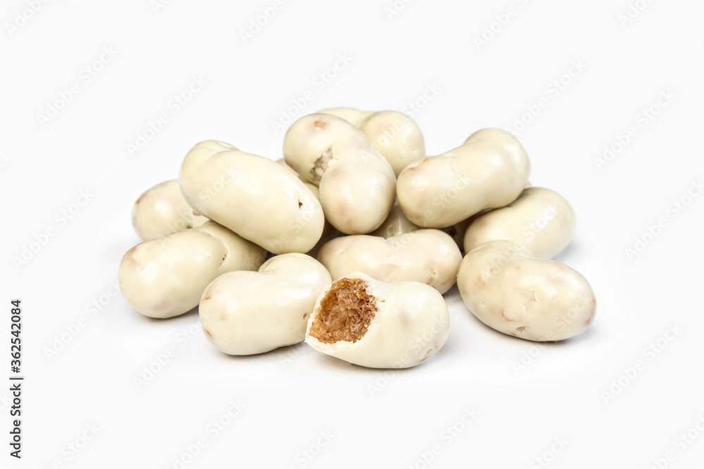 Peanut flips covered in white milk chocolate. Group of Tasty sweets isolated on white background Peanut flips covered in white milk chocolate. Group of Tasty sweets isolated on white background