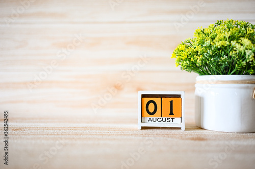 01 August Wooden calendar with Concept Start Hello August