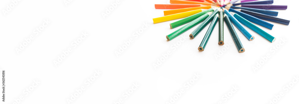 Colored pencils rainbow. White background.