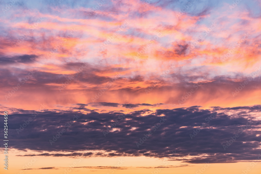 Fototapeta premium Colorful clouds after rain at sunset time.