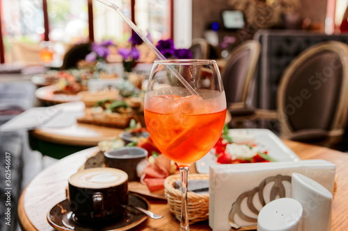 Spritz and various Italian food, toned