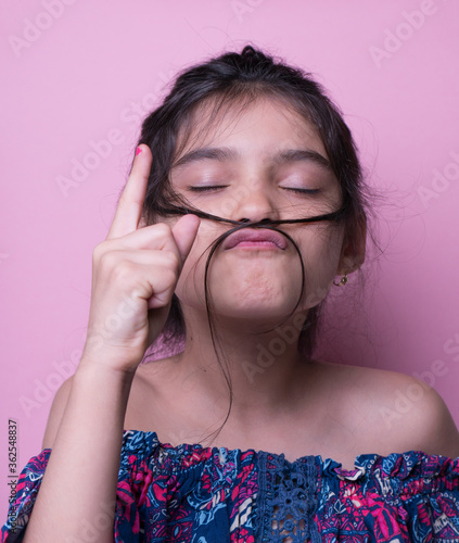 Excitement and fascination concept. Close up portrait. pink background. foolish grimaces comical crazy gesture. Funny expression.  non-verbal reaction. emotional ecpression Mock up, giggly photo